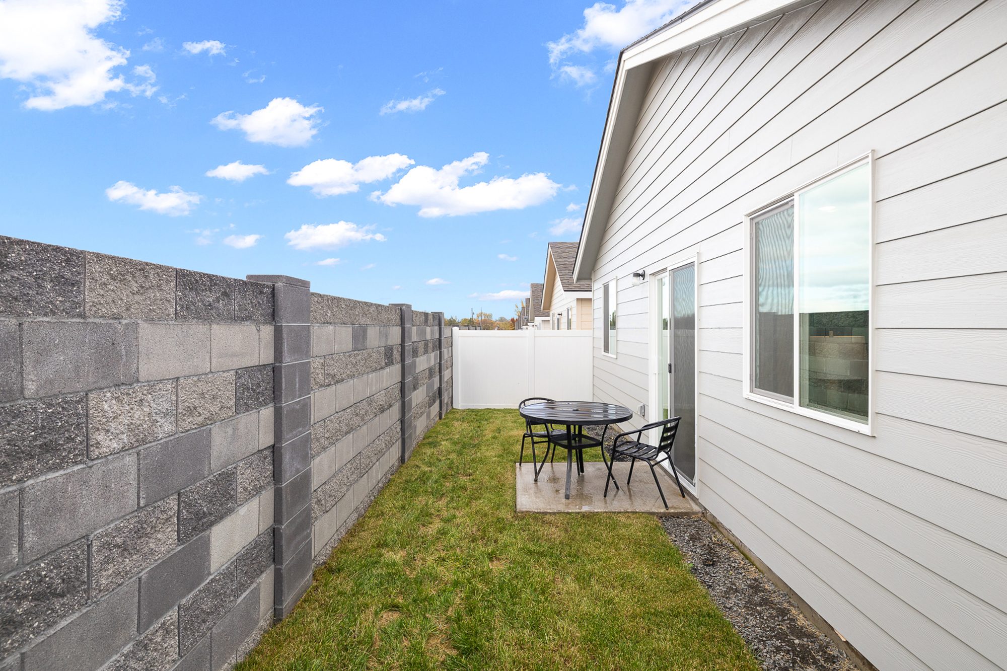 Back patio of a three bedroom, two bath Olin Homes home at 715 Tinley St