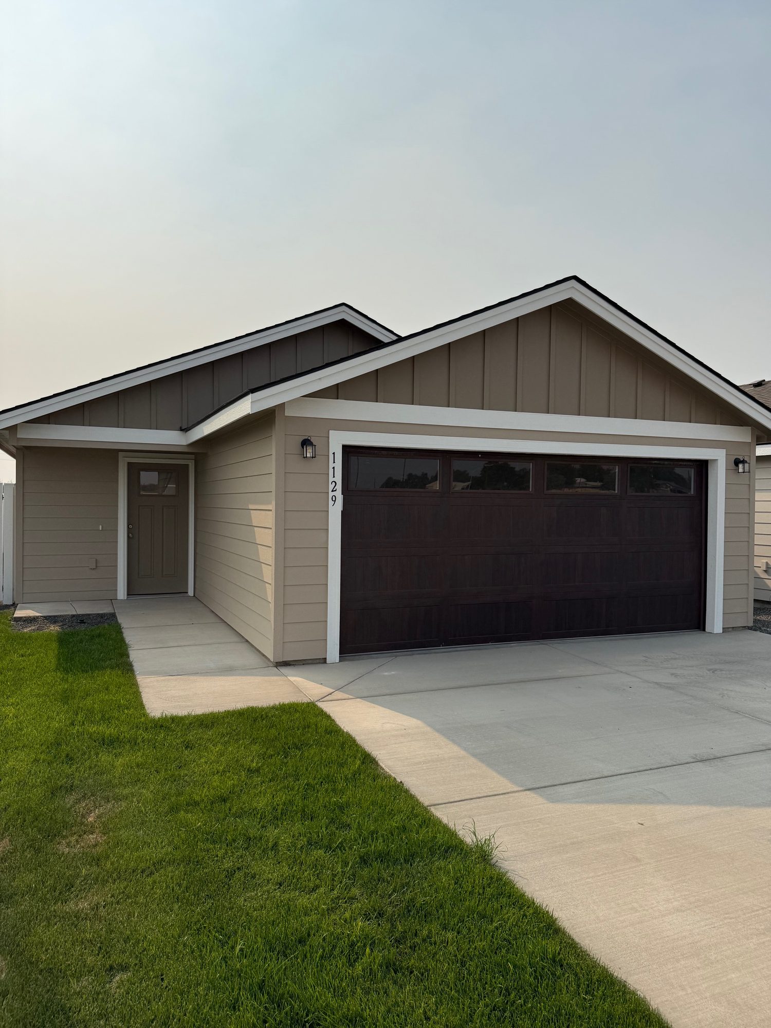Front exterior of 1129 NE 12th St, a new Olin Homes home in Diamond Run, Hermiston Oregon