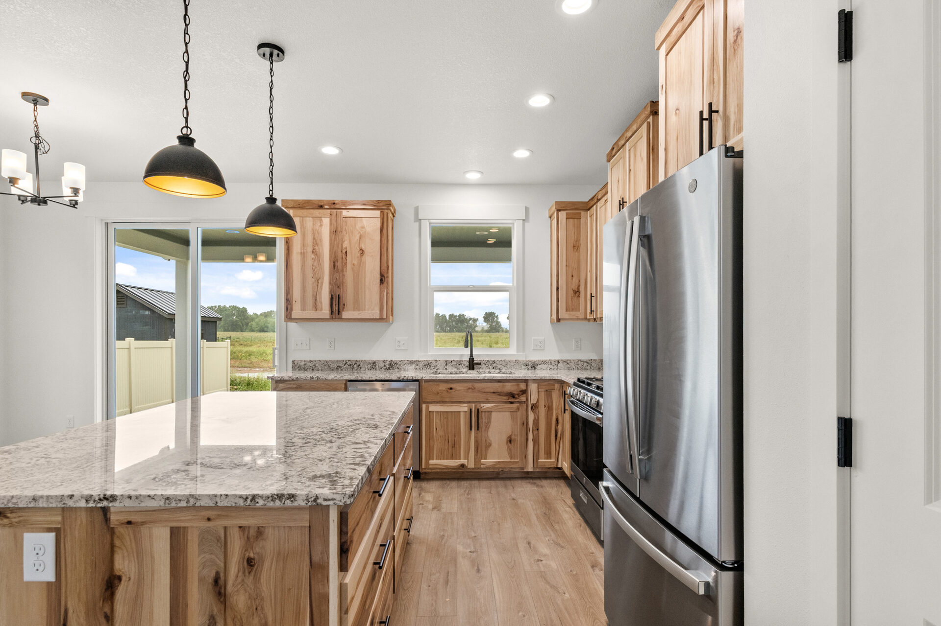 Kitchen with hickory cabinets at 230 Stirling Loop