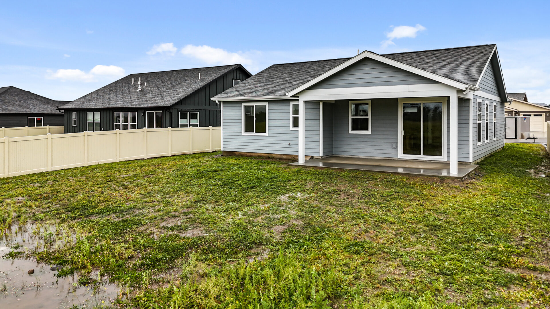 Backyard and patio of 230 Stirling Loop
