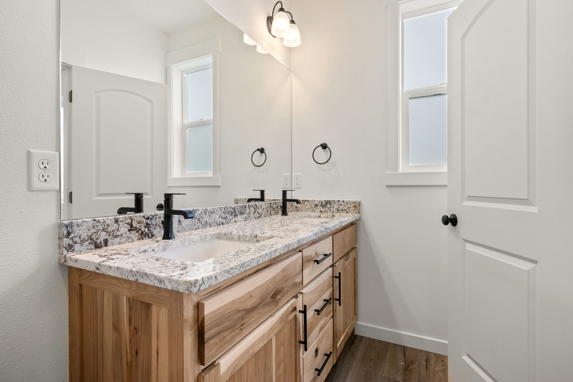 Primary bathroom vanity at 230 Stirling Loop