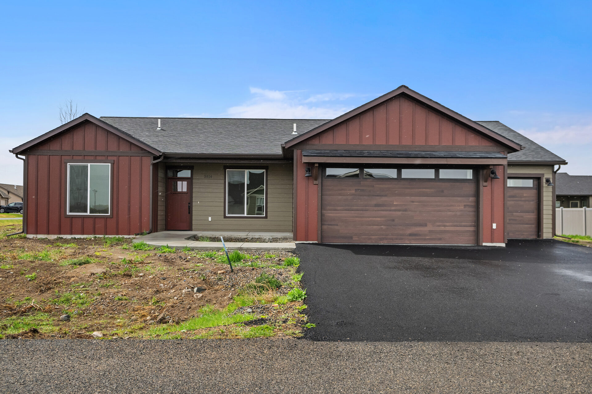 Front exterior view of a three bedroom, two bath Olin Homes home at 3814 Lovegrass Ln