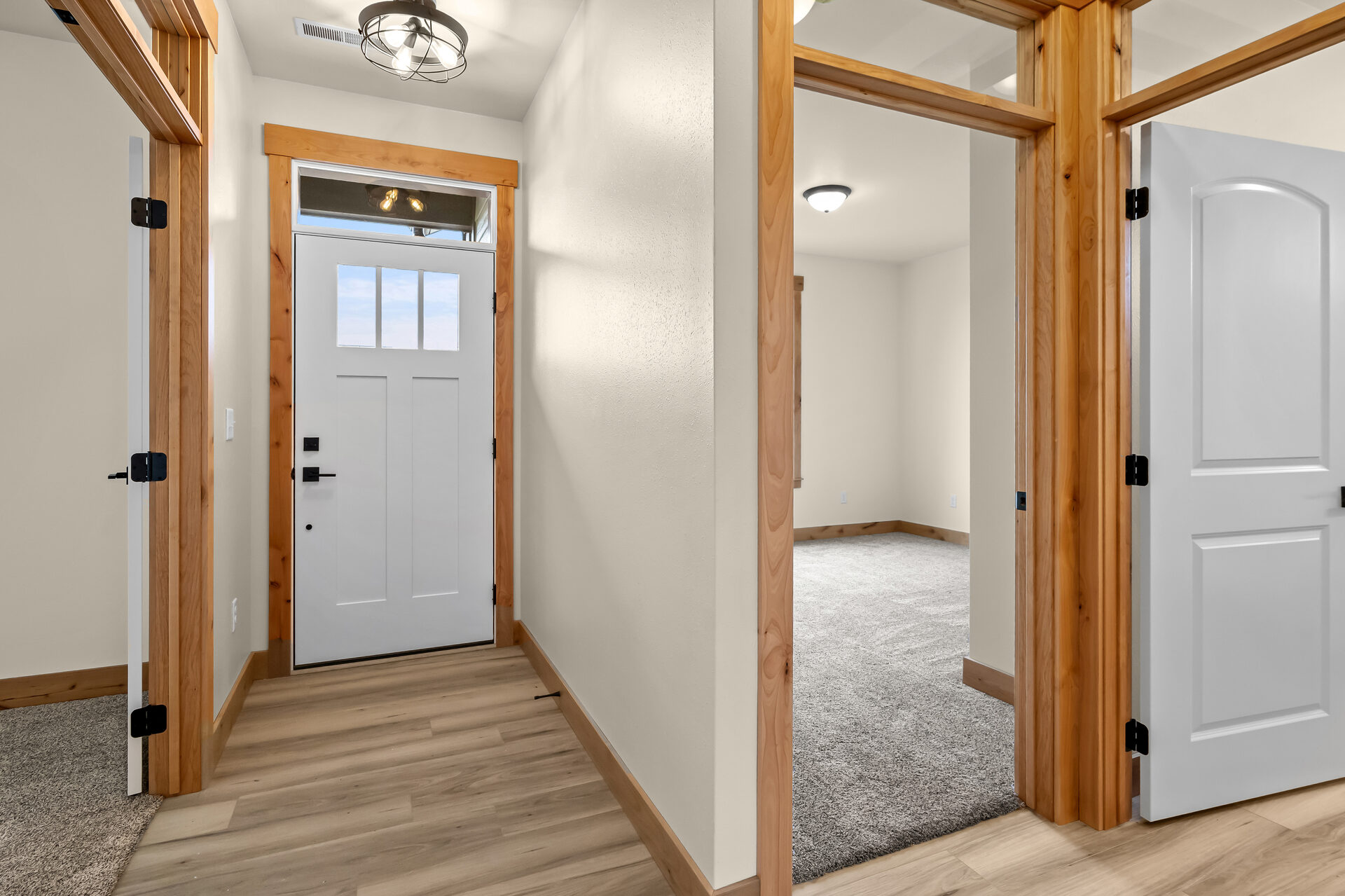 Entry foyer in a three bedroom, two bath Olin Homes home at 3814 Lovegrass Ln