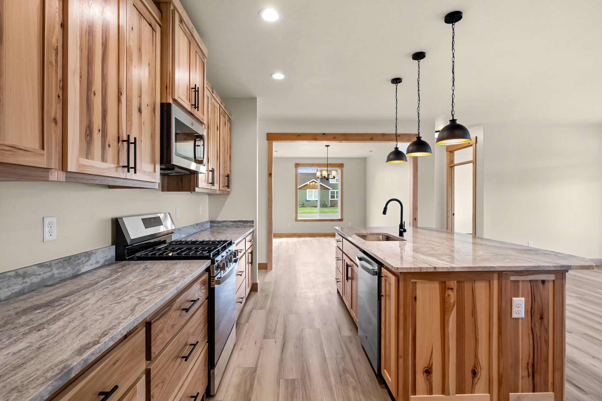 Kitchen view toward the dining area at 3814 Lovegrass Ln