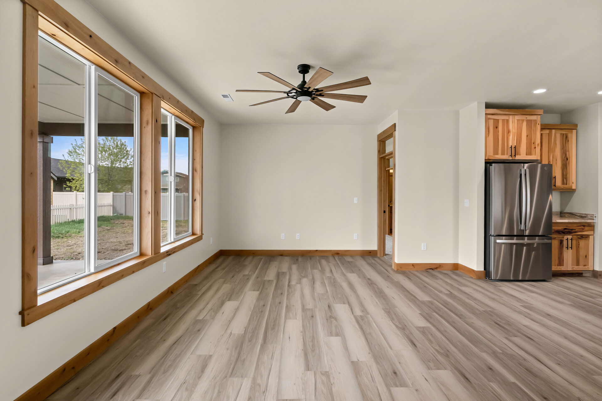 Living room open to the kitchen at 3814 Lovegrass Ln