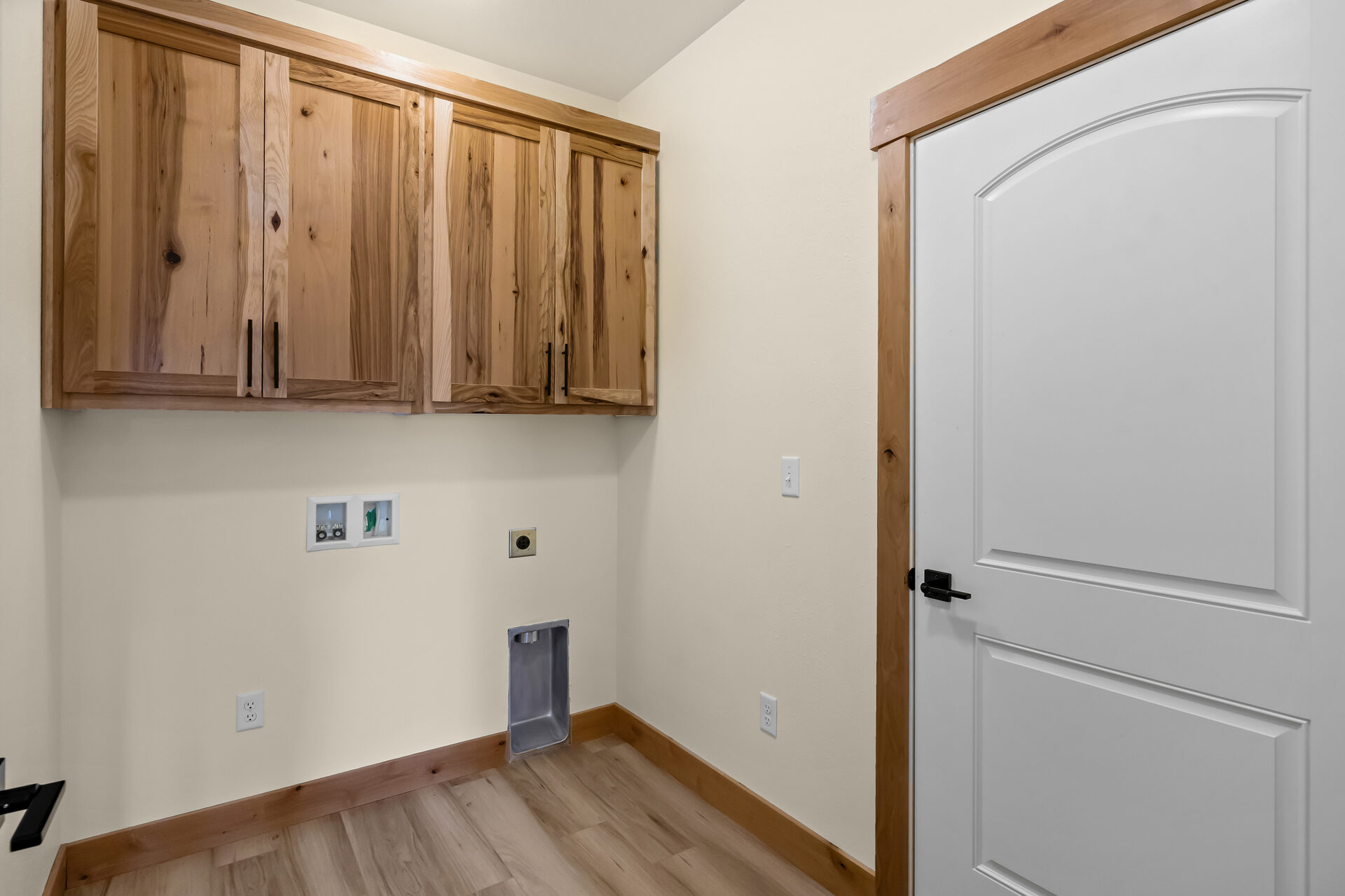 Laundry room in a three bedroom, two bath Olin Homes home at 3814 Lovegrass Ln