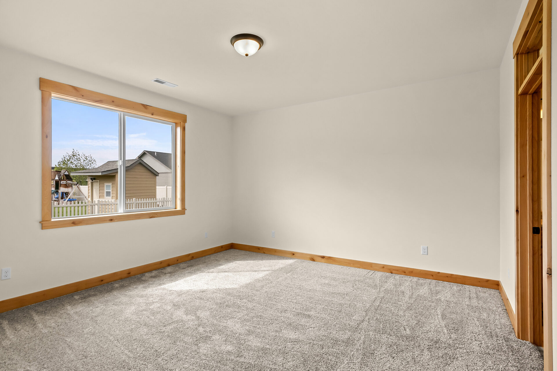 Third bedroom in a three bedroom, two bath Olin Homes home at 3814 Lovegrass Ln
