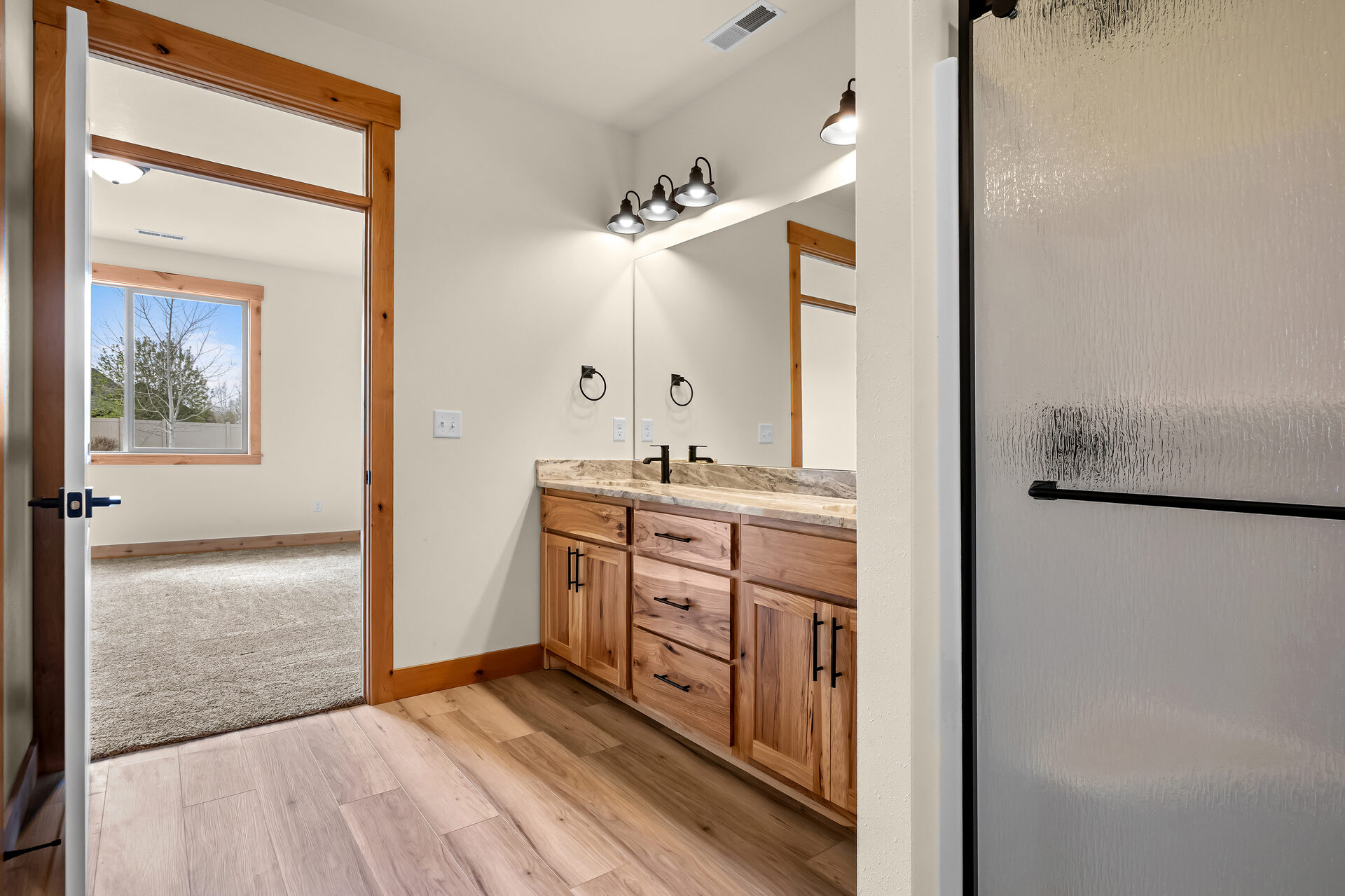 Primary bathroom vanity at 3814 Lovegrass Ln