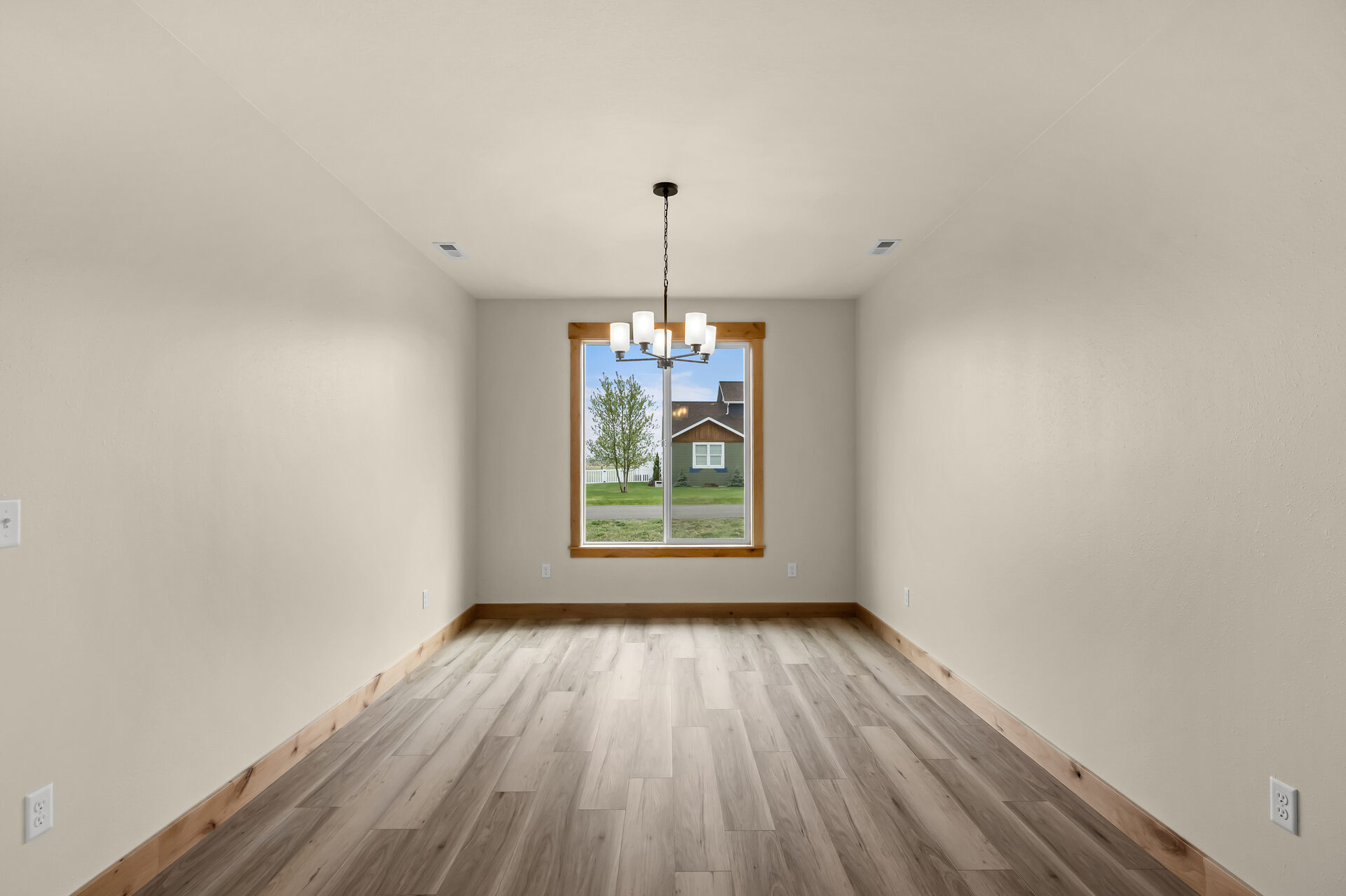 Dining room with slider to the backyard at 3814 Lovegrass Ln