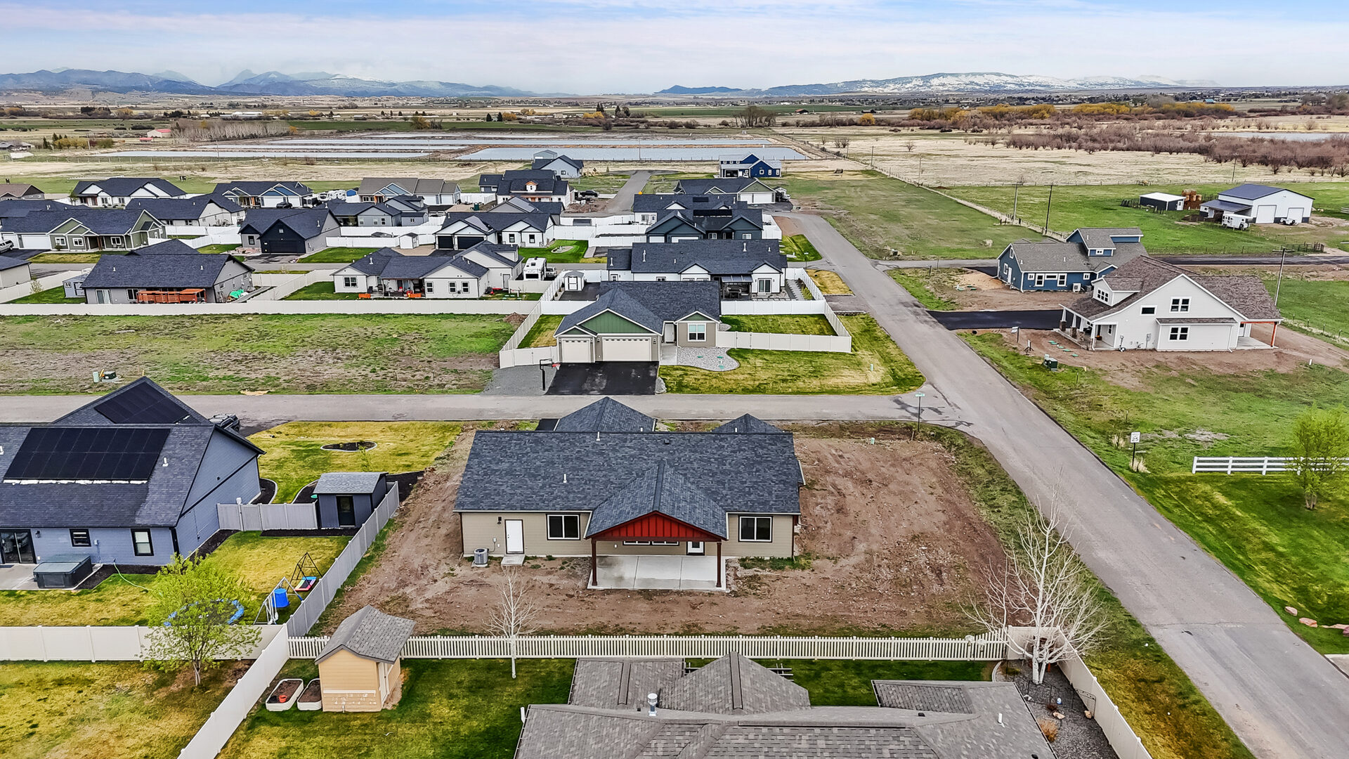 Aerial view of 3814 Lovegrass Ln and the surrounding valley