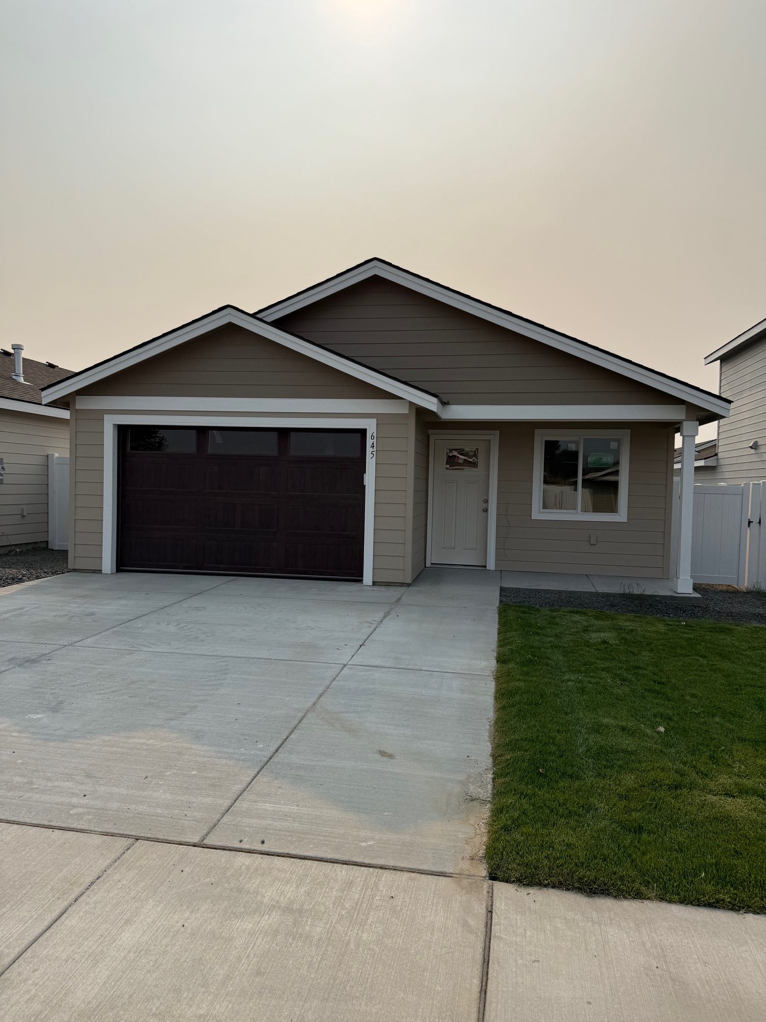 Front exterior of 645 Jimmy St, a new Olin Homes home in Bumble B Estates, Stanfield Oregon