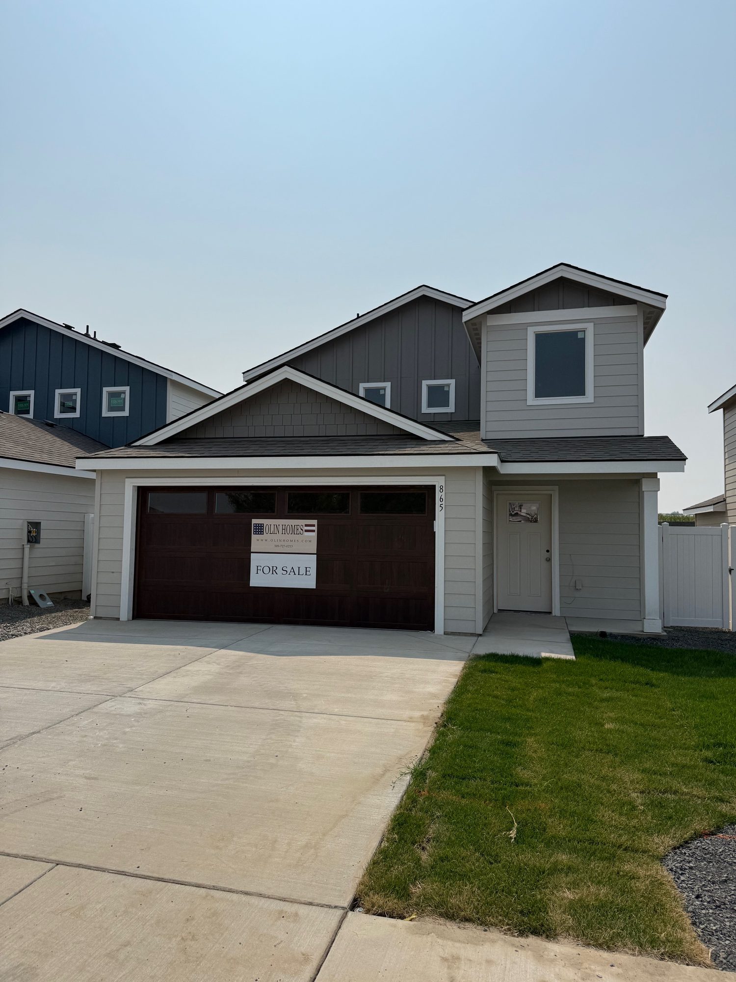 Front exterior of 865 Tinley St, a new two story Olin Homes home in Bumble B Estates, Stanfield Oregon
