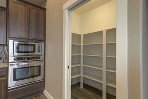 Pantry with wood shelving